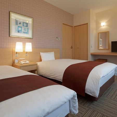 Kanazawa Tokyu Hotel Exteriör bild A typical room at the hotel