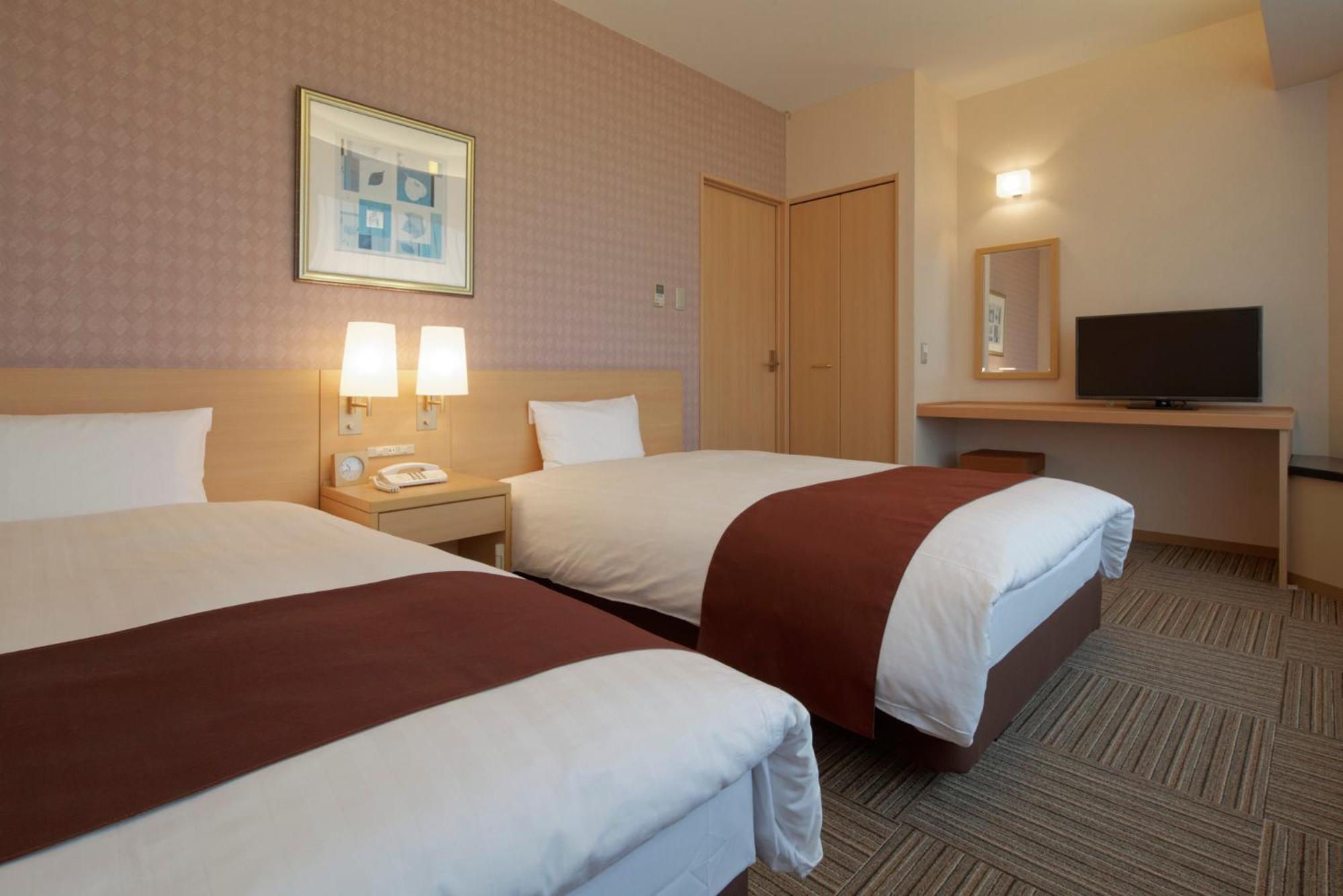Kanazawa Tokyu Hotel Exteriör bild A typical room at the hotel